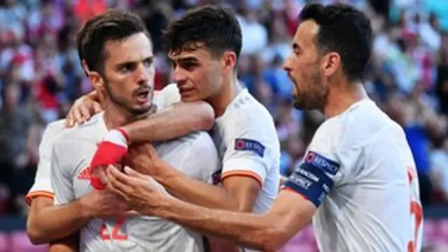Spain celebrate Sarabia's goal