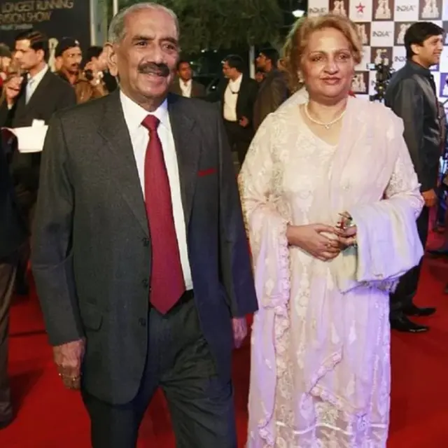 آر کے دھون اور ان کی اہلیہ اچلا