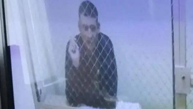 Фото Сергея Тихановского по видеосвязи из тюрьмы