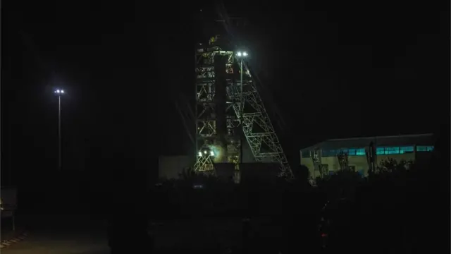 Photograph taken in the dark shows the mineshaft of the mine where men are trapped