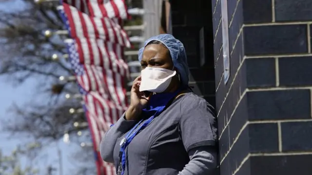 A woman outside a hospital