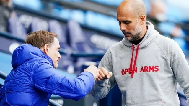 Thomas Tuchel and Pep Guardiola bump fists