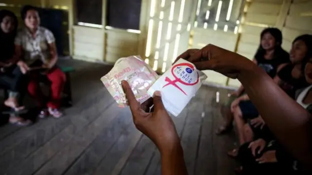 Sex workers are educated on the use of condoms on October 6, 2009 in Merauke, West Papua near Jayapura, Indonesia. b