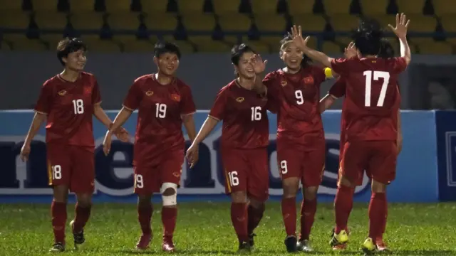 Huynh Nhu (2nd R) of Vietnam celebrates her side's first goal with her team mates during the Women's Olympic Football Tournament Play-Off 2nd Leg between Vietnam and Australian Matildas at Cam Pha Stadium on March 11, 2020 in Cam Pha, Vietnam