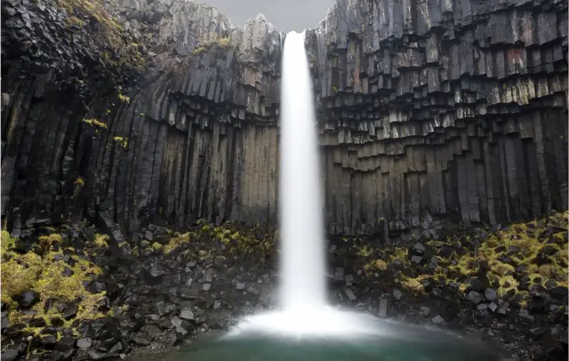 Waterfall over basalt rock