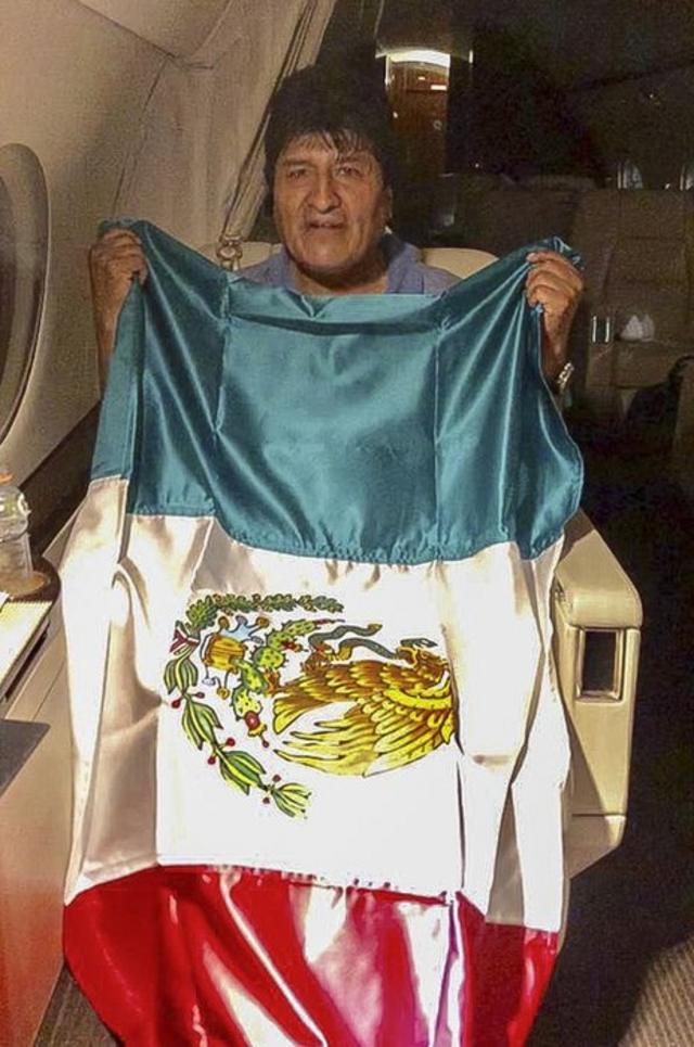 A handout picture released by the Mexican Foreign Ministry press office shows former Bolivian President Evo Morales leaving Bolivia in an aircraft of the Mexican Air Force on 11 November, 2019.