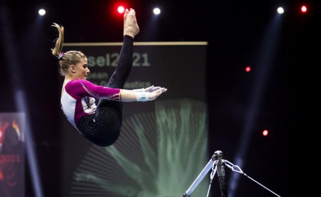 Woman in lycra body suit doing gymnastics on Craiyon