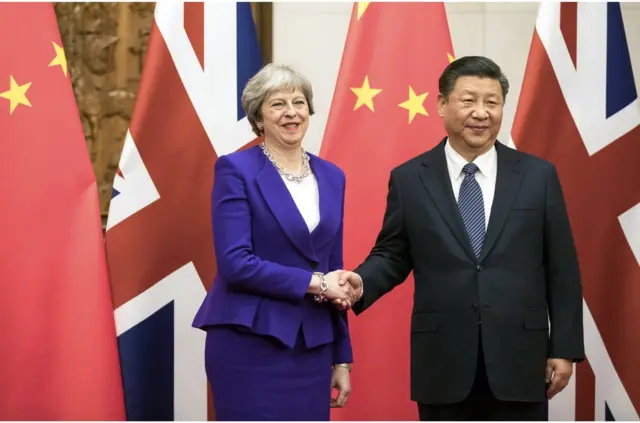 British Prime Minister Theresa May (L) shakes hands with Chinese President Xi Jinping ahead of their bilateral meeting at the Diaoyutai State Guest House in Beijing, China, 01 February 2018. May is in China on a three-day visit. EPA/CHRIS RATCLIFFE / POOL