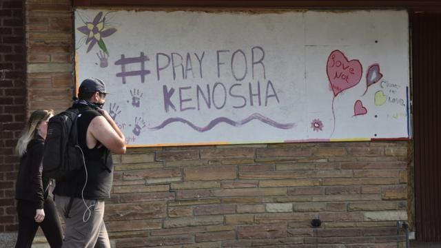 A sign reading "Pray for Kenosha" in Wisconsin