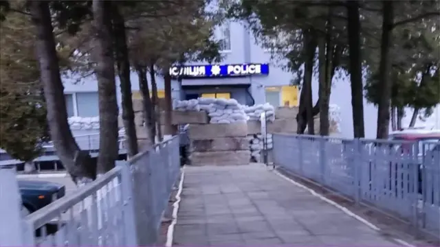 Police station entrance in Stryi protected with sandbags