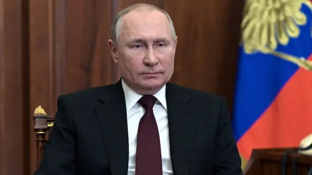 Russian President Vladimir Putin delivers a video address to the nation in Moscow