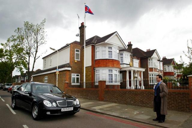 Photo taken on 30 April 2003 showing a diplomatic car driving away from the North Korea (DPRK) Embassy in a residential area in Ealing, west London.