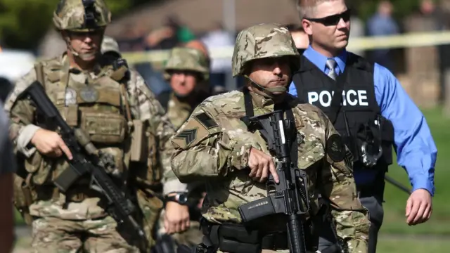 Authorities respond to a report of a shooting at Umpqua Community College in Roseburg, Oregon, on 1 October 2015