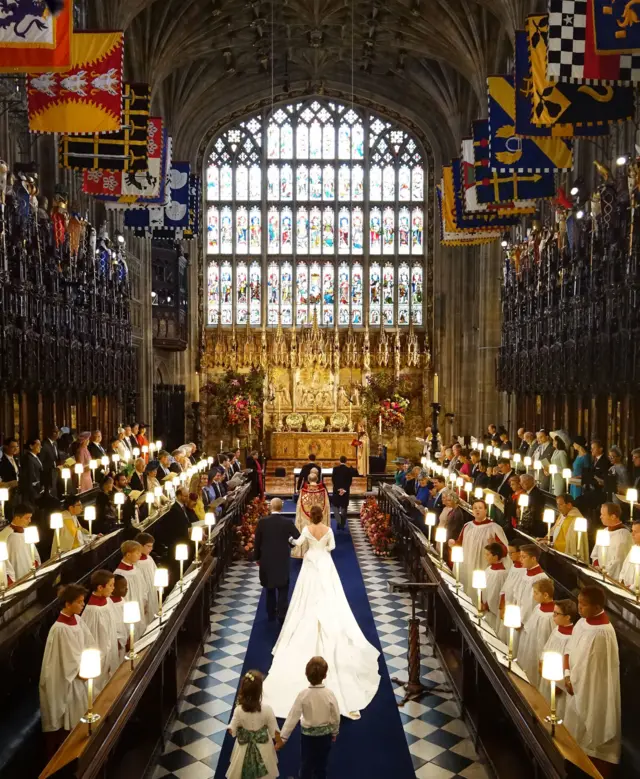 Princess Eugenie of York walks down the aisle with her father Prince Andrew, Duke of York