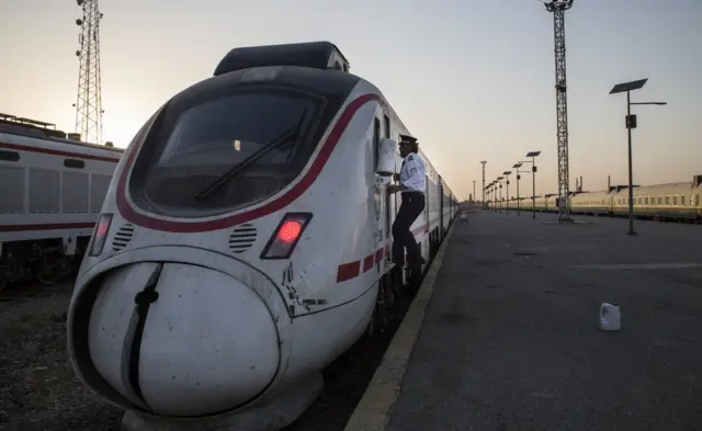 Ali Al-Karkhi boards the train for an inspection