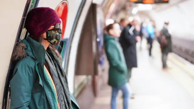 People social distancing on a tube platform