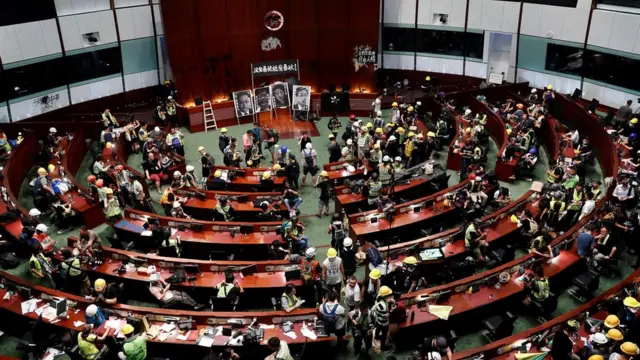 People are seen inside a chamber, after protesters broke into the Legislative Council building during the anniversary of Hong Kong"s handover to China in Hong Kong, China July 1, 2019.