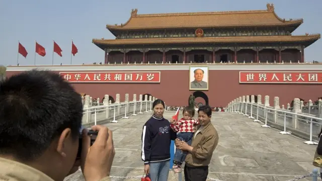 Touristes sur la place Tiananmen