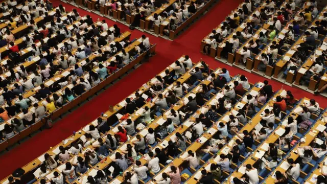 Postgraduate applicants have classes at an assembly hall