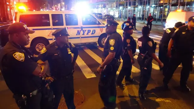 Police block a road after an explosion in Chelsea, New York on 17 September 2016