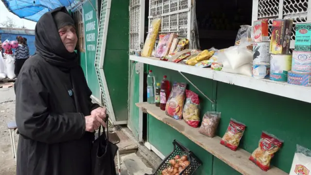 Женщина на рынке в Гали