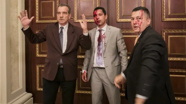 Diputados ensangrentados.