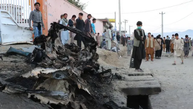 Wreckage outside a Kabul school following bombings in May 2021