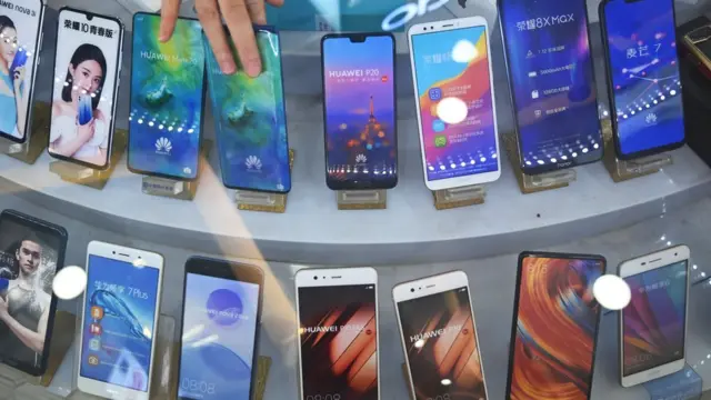 Huawei smartphones are displayed at a store in Shanghai on May 27, 2019.