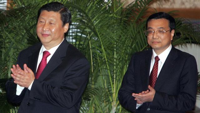 Xi Jinping (L) together with Li Keqiang