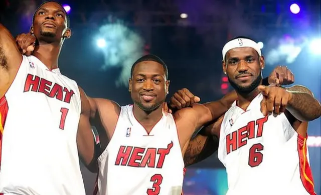 MIAMI - JULY 09: Fans cheer as (L-R) Dwyane Wade #3, Chris Bosh #1 and LeBron James #6 of the Miami Heat are introduced during a welcome party at American Airlines Arena on July 9, 2010 in Miami, Florida. (Photo by Marc Serota/Getty Images)