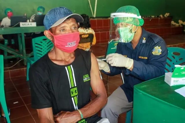 Vaksin, Papua, Covid-19