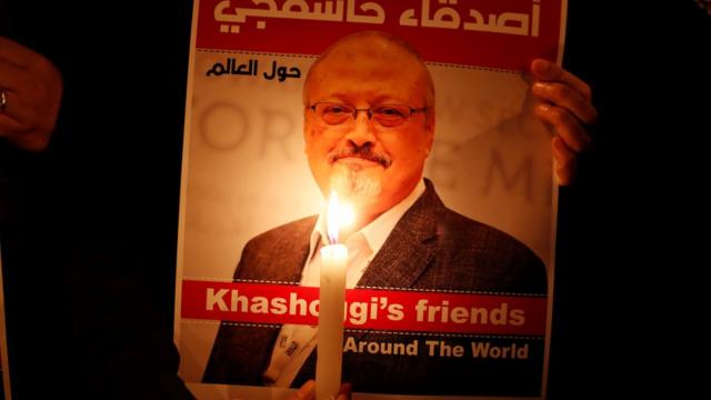 A demonstrator holds a poster with a picture of Jamal Khashoggi outside the Saudi consulate in Istanbul, Turkey October 25, 2018