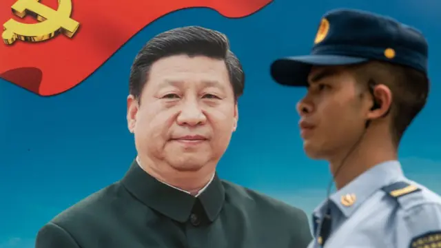 Militar chinêsb2xbet 5 reaisfrente a pôster com imagemb2xbet 5 reaisXi Jinping