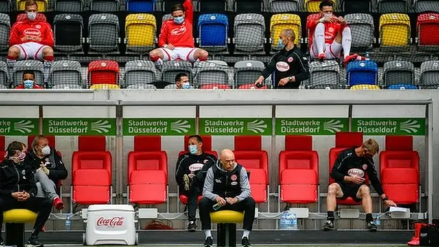 Substitutes all sat apart and wore masks