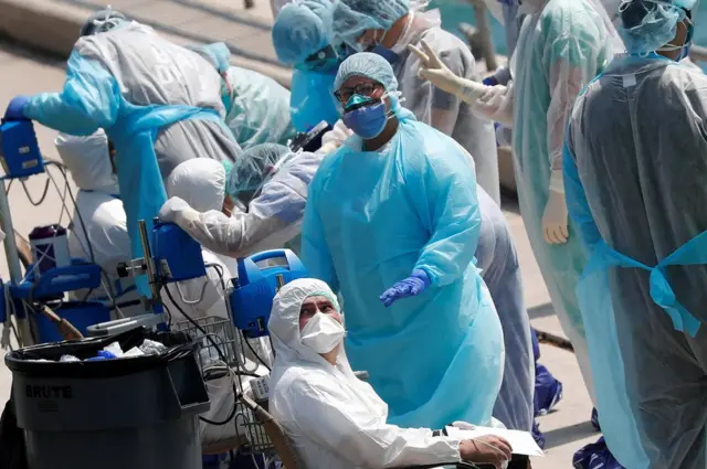 First responders evacuate sick crew members