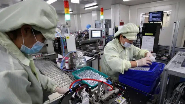 Сотрудники южнокорейской компании Boditech Med Inc., производящей приборы AFIAS для тестирования коронавируса