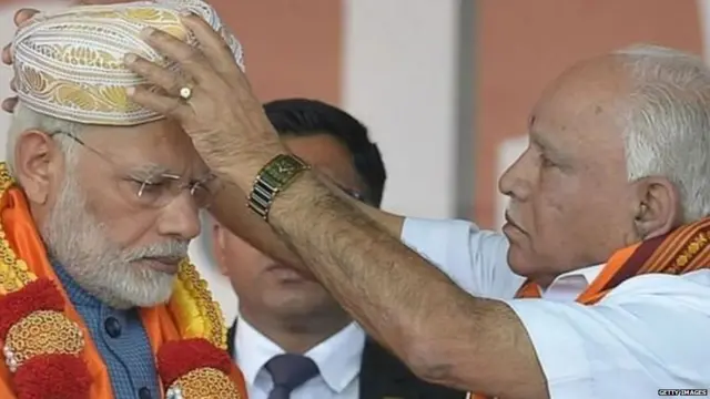 बी. एस. येडियुरप्पा आणि नरेंद्र मोदी