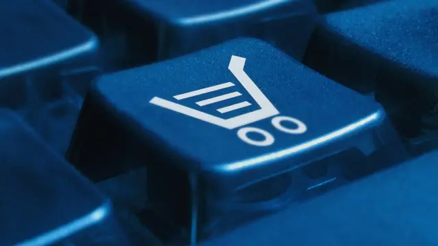 Teclado con un signo de carro de compras