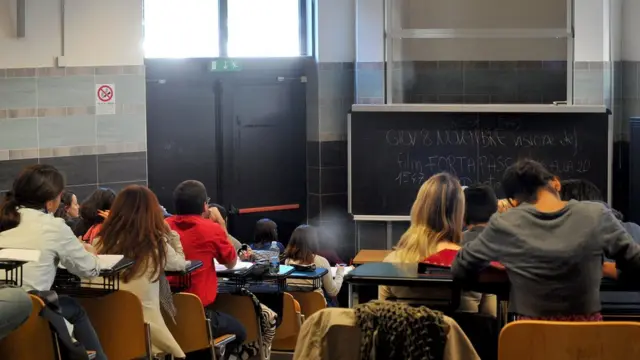 Students follow a lesson at the Roma Tre university in Rome