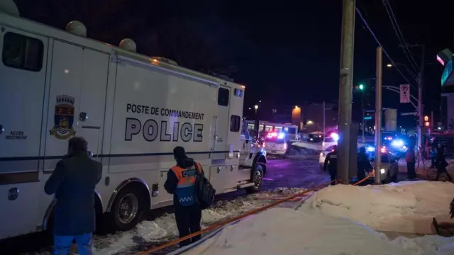 Police arrive at the scene of the shooting