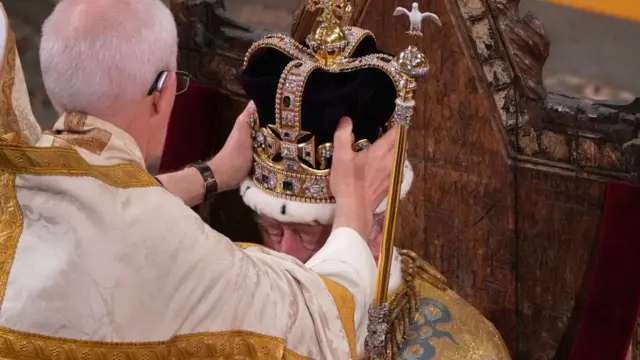 King Charles III is crowned with St Edward's Crown by The Archbishop of Canterbury the Most Reverend Justin Welby during his coronation ceremony in Westminster Abbey