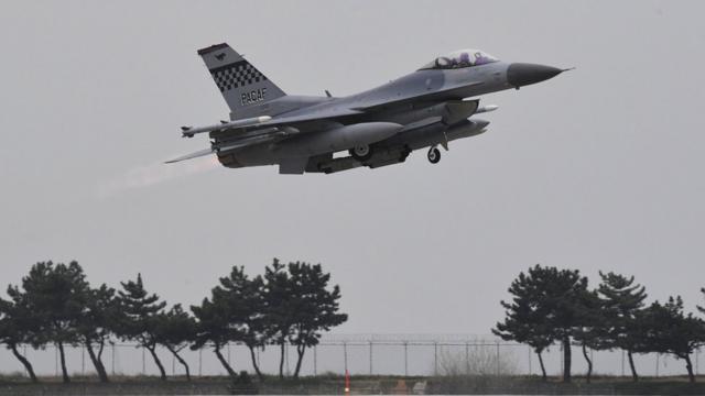 A South Korean F-15K jet fighter takes off during the 'Max Thunder' South Korea-US military joint air exercise at a US air base in the southwestern port city of Gunsan
