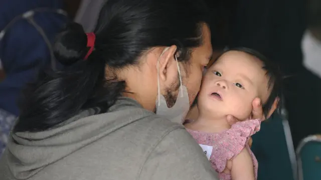 A number of children with Down's syndrome attend a 2023 Down Syndrome Day event at Graha Pandawa, Yogyakarta, in Indonesia in March 2023