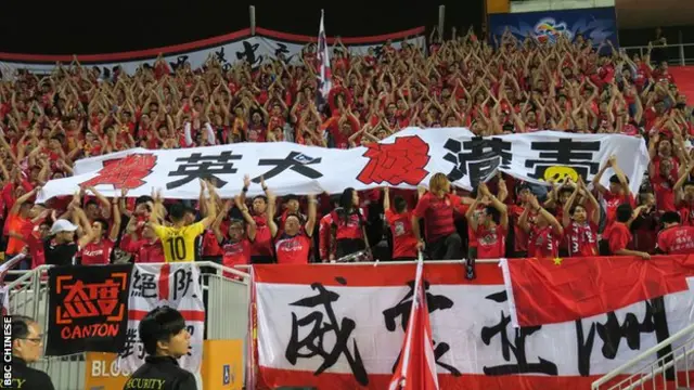 Guangzhou Evergrande fans show a banner that reads "Annihilate British dogs, extinguish HK independence poison" during the match at the Mong Kok Stadium in Hong Kong, 25 Apr 2017.
