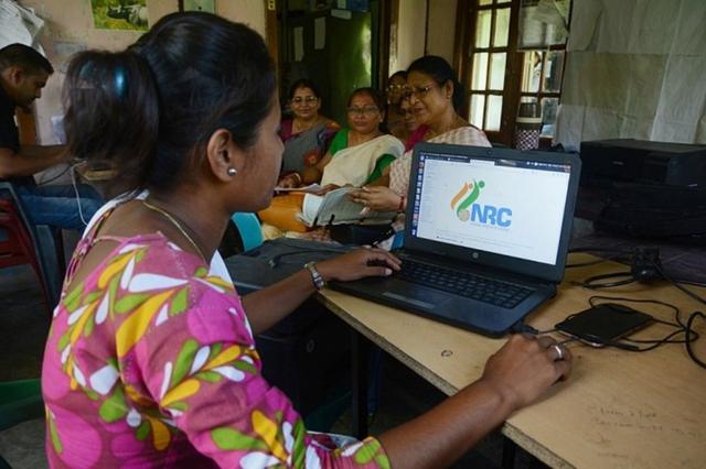 Indian worker of National Register of Citizens (NRC) office checks different documents which were submitted by people for NRC ahead of the release of the final draft of NRC in Guwahati, Assam, India, 26 August 2019.