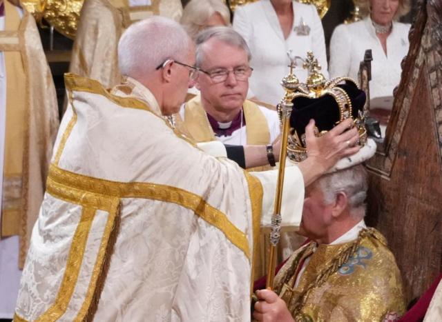 King Charles III is crowned with St Edward's Crown by The Archbishop of Canterbury the Most Reverend Justin Welby during his coronation ceremony in Westminster Abbey, London