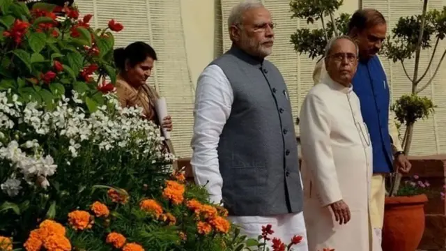 नरेंद्र मोदी और प्रणब मुखर्जी