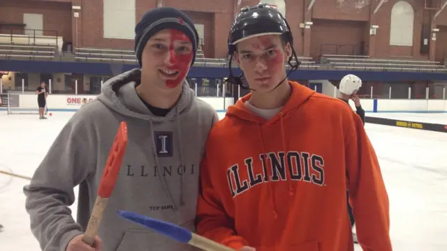 Marcin Kleczynski and a friend at college playing the sport of broomball