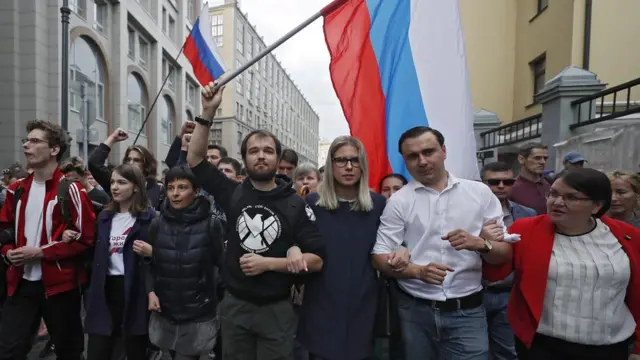 Юлия Галямина, Иван Жданов, Любовь Соболь на незапланированном шествии 14 июля)