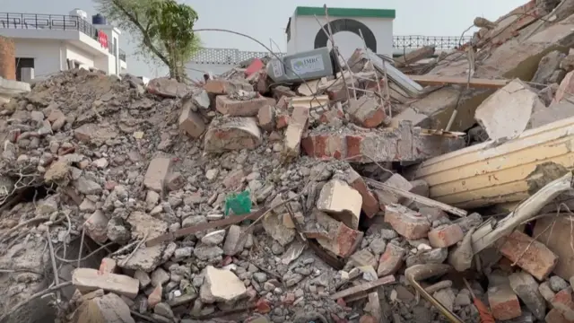 जावेद मोहम्मद का घर ढहाने के बाद की तस्वीर